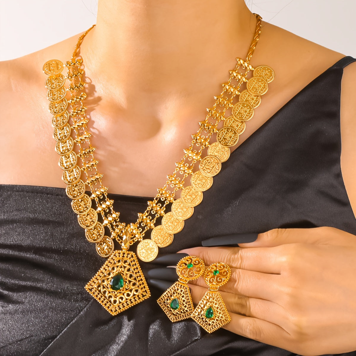 Complete your look with our stunning set of traditional Arabian style copper golden plated jewelry. This set includes jhumka earrings, a necklace, and a bracelet, perfect for adding a touch of elegance to any outfit. Whether for a Ramadan wedding or