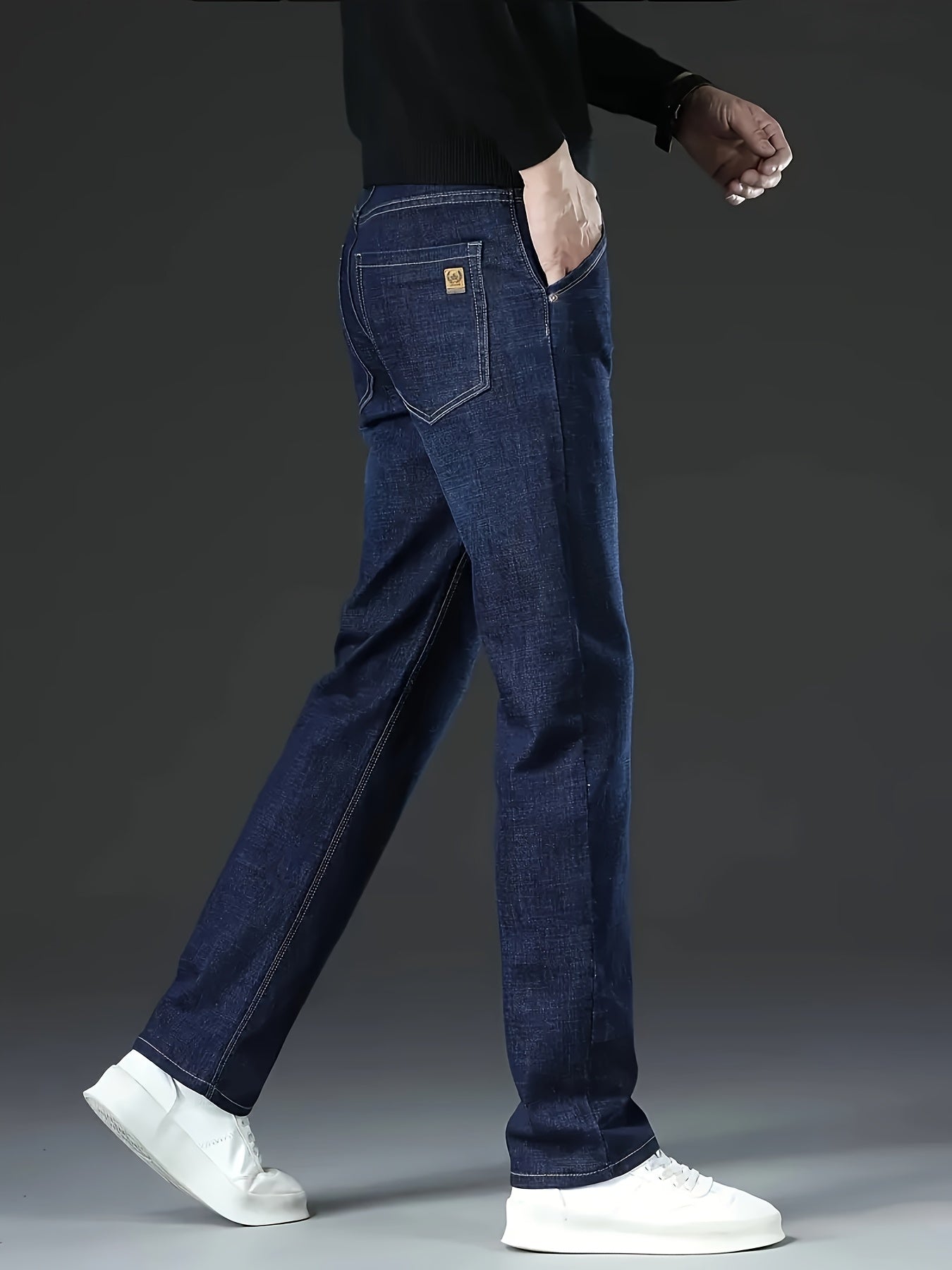 Classic straight-leg jeans for men in a comfortable business-casual style, made from a cotton blend with stretch, and solid washed denim suitable for year-round wear.