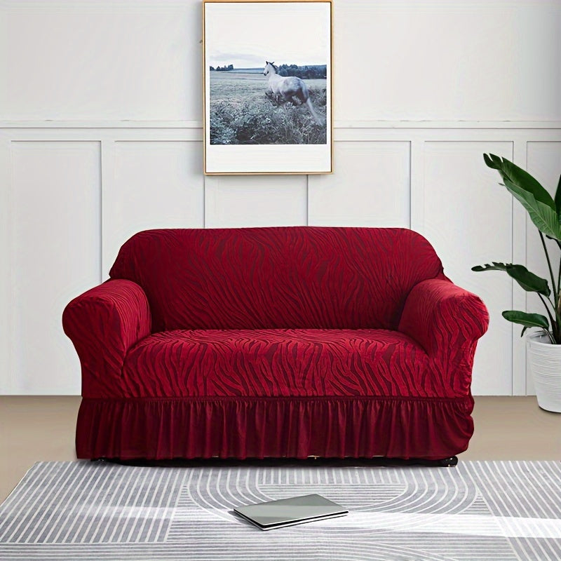 Wave pattern sofa slipcover with skirt, non-slip and dustproof. Protects furniture from cat scratches. Machine washable for easy cleaning. Suitable for bedroom, office, or living room décor.