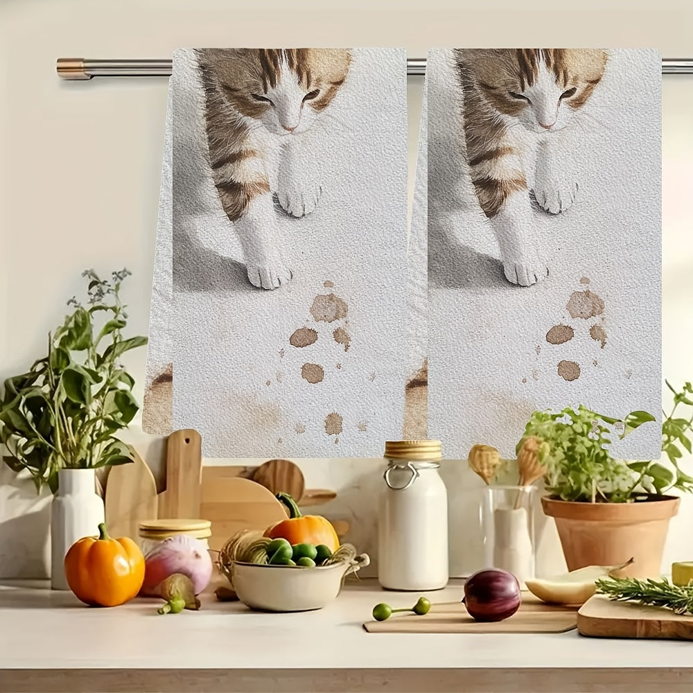 2 pieces of ultra soft kitchen towels, featuring the delicate steps of a kitten as it tiptoes. These highly absorbent dish hand towels are perfect for holiday decor. They are machine washable and measure 16x24 inches. Item number: 2KYSYS1218474