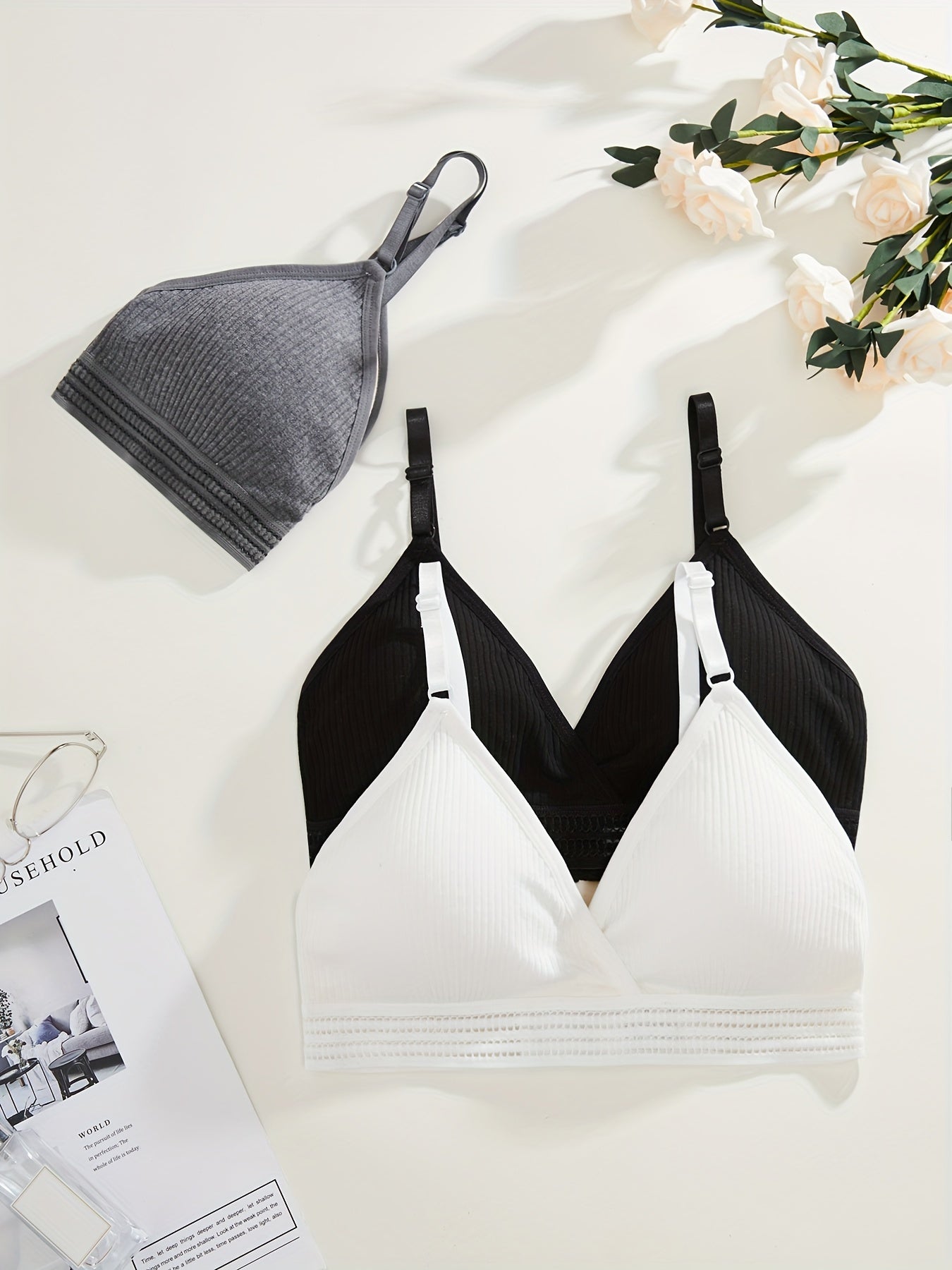 Soft, versatile bra set with removable pads and ribbed texture in black, white, and gray. Perfect for everyday comfort wear.