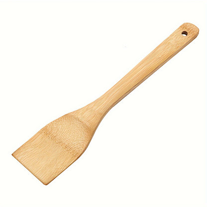 Bamboo wood spatula for non-stick cooking, perfect for Halloween and Christmas.