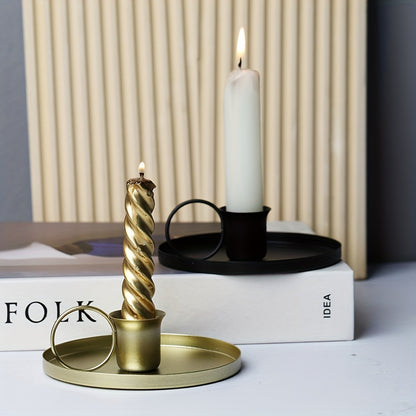 Stylish metal candle holder for table decor at home, ideal for dinner parties and special occasions.