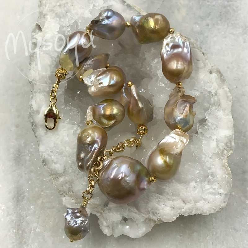 Handcrafted MYSOYA Baroque Pearl Necklace featuring 100% natural freshwater pearls ranging from 21-28mm. This elegant and luxurious jewelry piece is perfect for everyday wear, weddings, and special occasions. Makes a stunning Valentine's Day gift or June