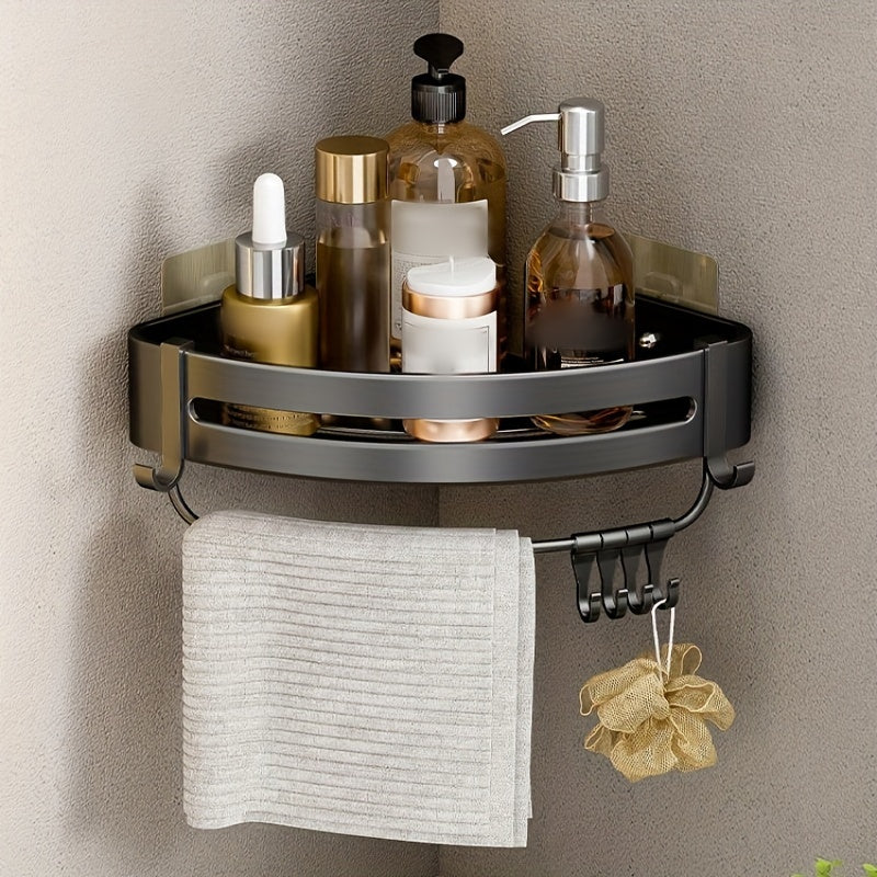 Wall-mounted bathroom storage rack for shampoo, shower gel, and cosmetics; made of space aluminum with no need for drilling.