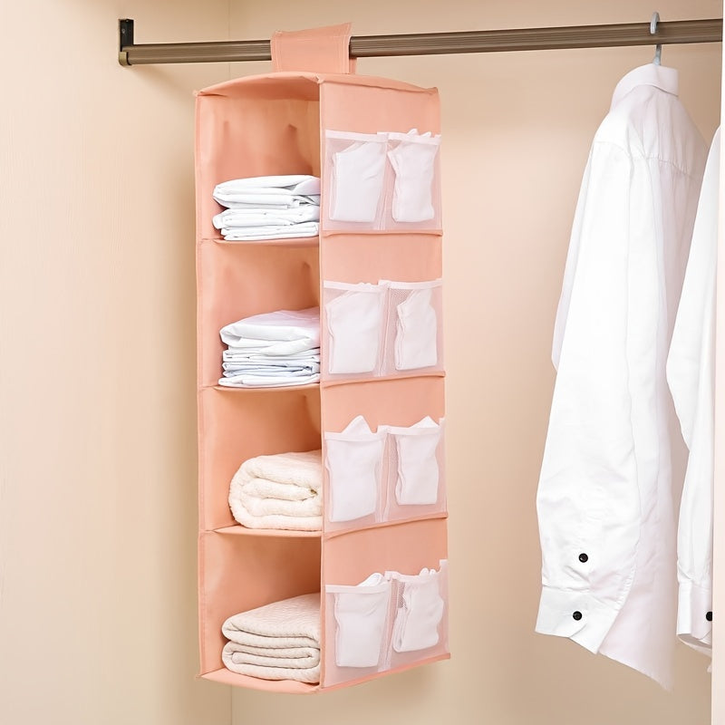 Keep your items organized and easily accessible with this Wardrobe Storage Hanging Bag. It is foldable, washable, and features four layers of storage space for bags, clothes, socks, and more. Save space and maintain neatness in your wardrobe with this