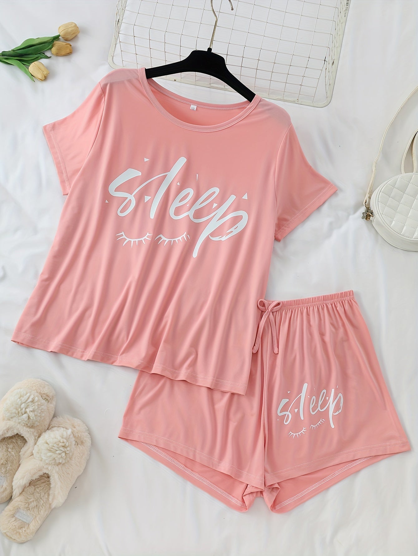 Women's 3-piece pajama set featuring alphabet print, polyester knit fabric with stretch, color block short sleeve top and shorts. Perfect for fall season lounging at home.