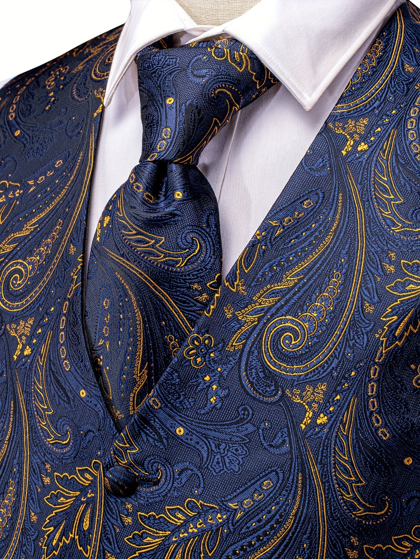 White paisley pattern accessories for big men: waistcoat, necktie, hanky, and cufflinks