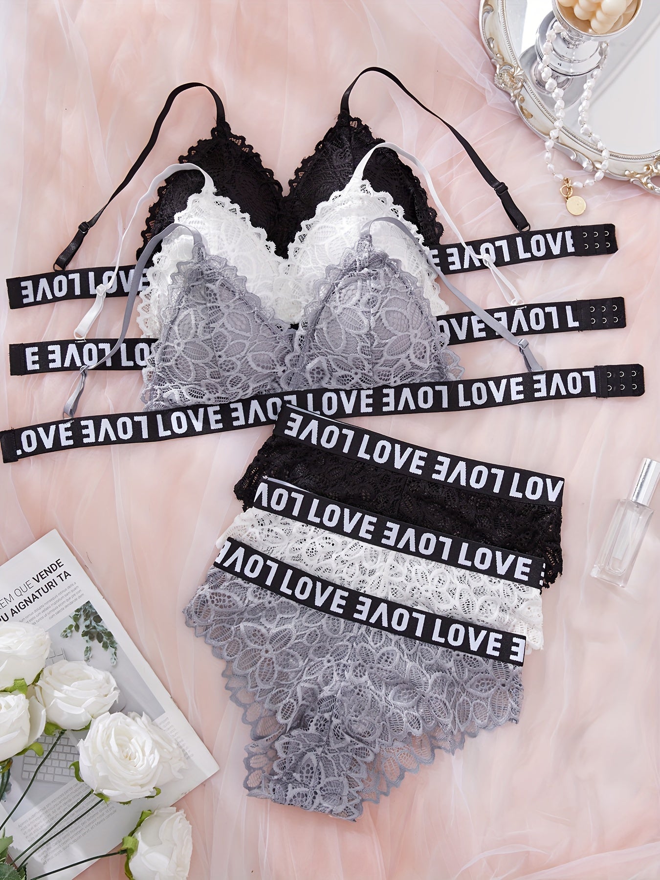 6-piece lace lingerie set for women featuring sporty and sexy wireless bra and panties with "LOVE" waistband. Made with breathable black and white floral lace for a comfortable fit.