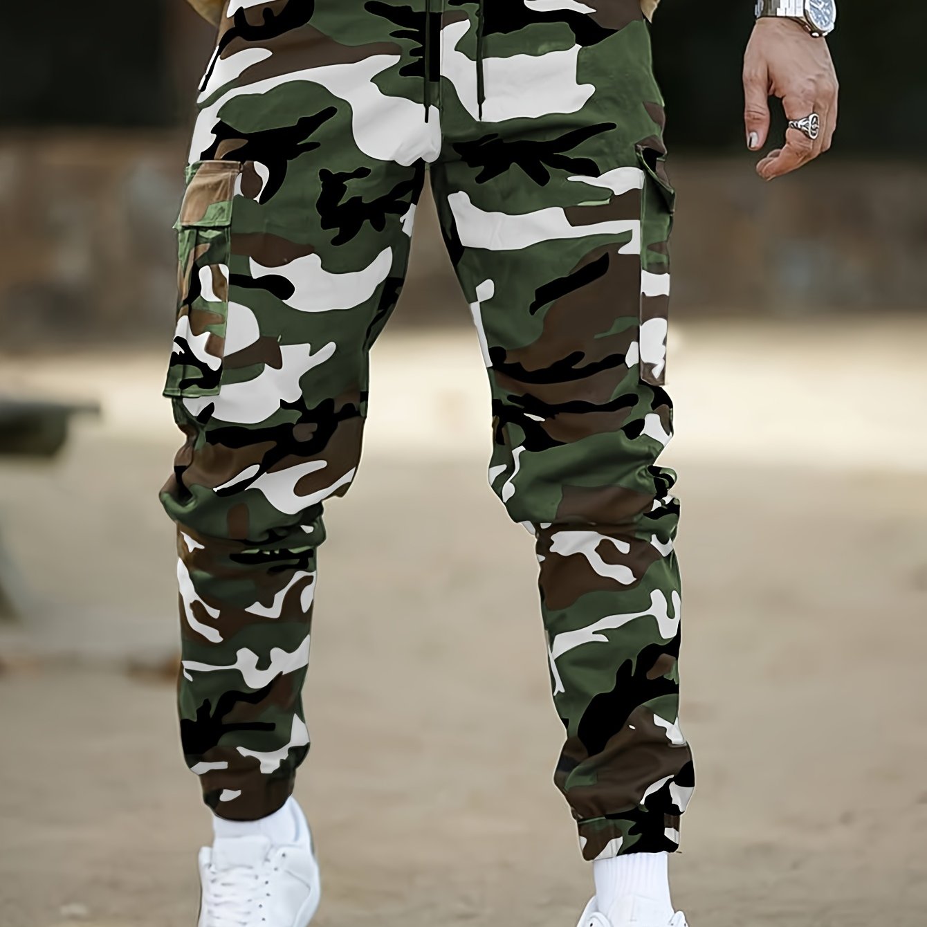 Camouflage cargo pants for men, ideal for outdoor activities in spring and autumn.