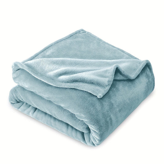 This stylish and minimalist 1 piece 200g solid color flannel blanket is a perfect addition to any indoor decor. It is suitable for single or double beds and can be used in offices, hotels, and dorms. This soft and warm sofa blanket has a beautiful design