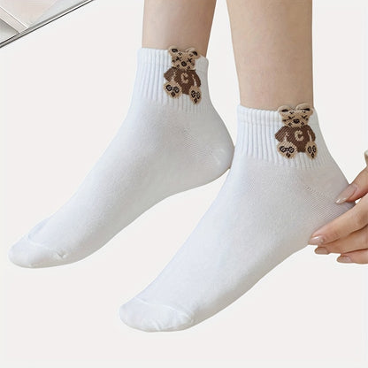 5 pairs of cute and soft white cartoon print short socks for women, made of breathable material.