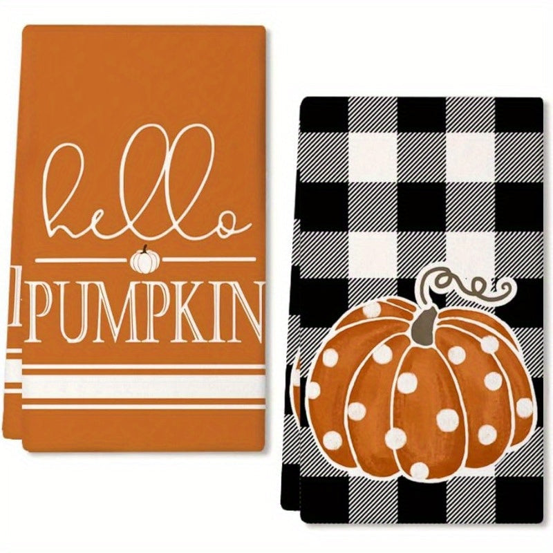 Set of 2 kitchen towels measuring 45.72*66.04 cm featuring autumn pumpkin elements for home decor. These reusable towels are perfect for parties, holiday decorations, and make a great gift. The design includes a black buffalo plaid polka dot pumpkin