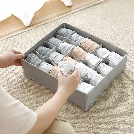 Foldable storage box for socks and underwear, ideal for organizing your lingerie, panties, socks, briefs, and ties in your closet or dresser. Keep your clothes neatly stored and hidden away with this convenient bedroom accessory.