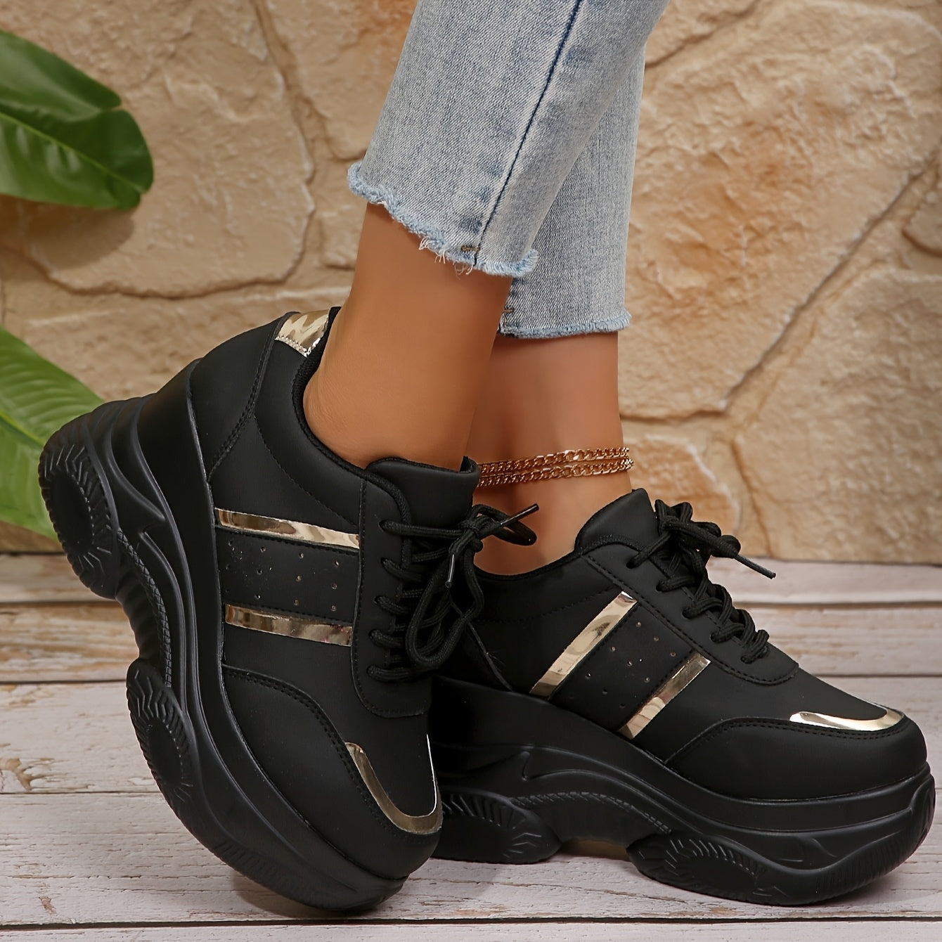 Gold-trimmed lace-up height-increasing casual sports shoes for women.