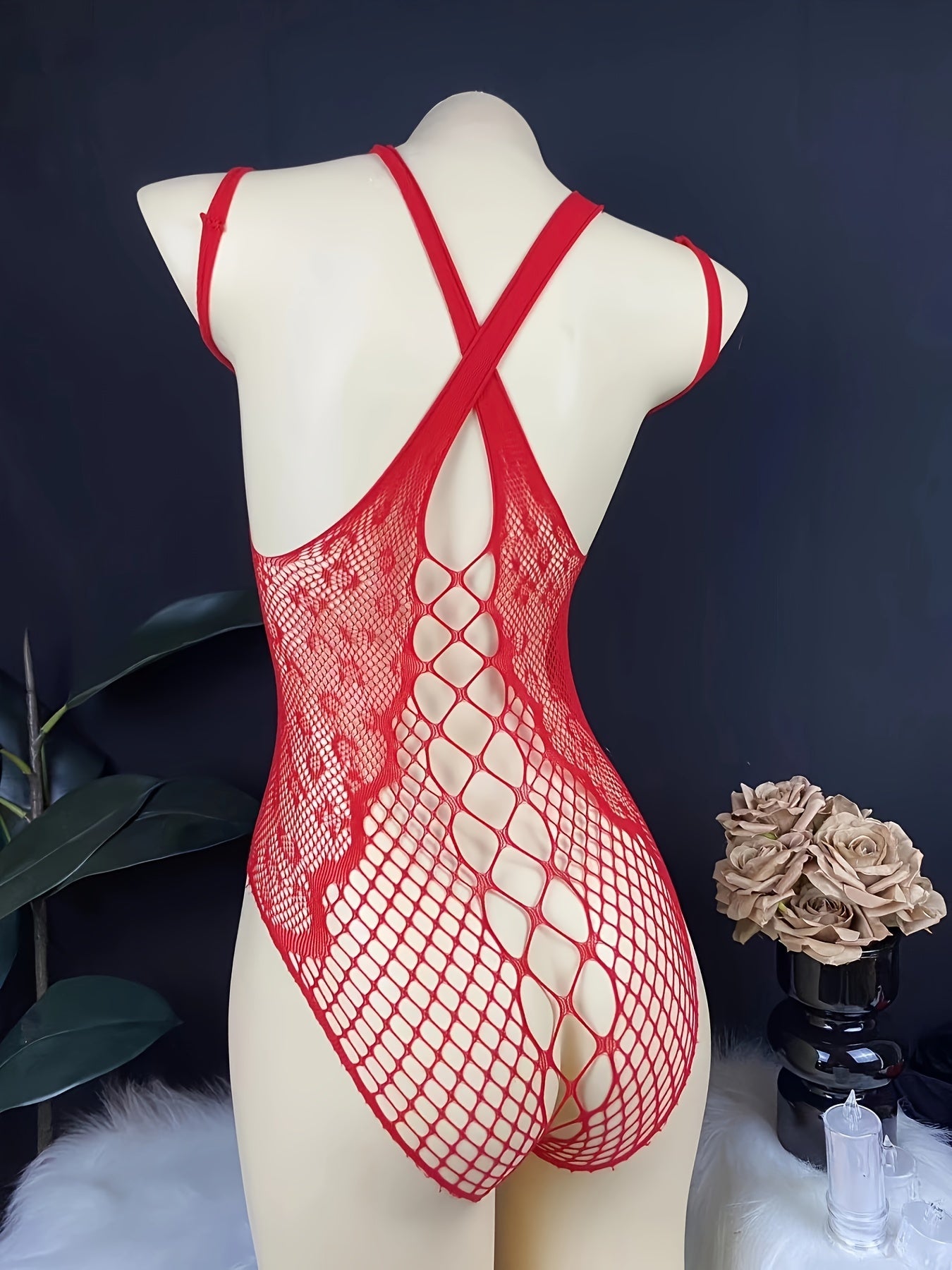 Red lace mesh bodysuit for women with hollow-out design, made of nylon. Features a tight and cropped style in knitted fabric.