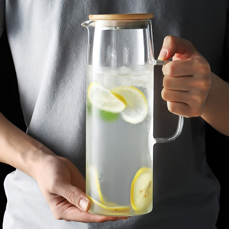 Leak-proof glass pitcher with bamboo lid, perfect for iced tea, juice, and water. Ideal for home use.