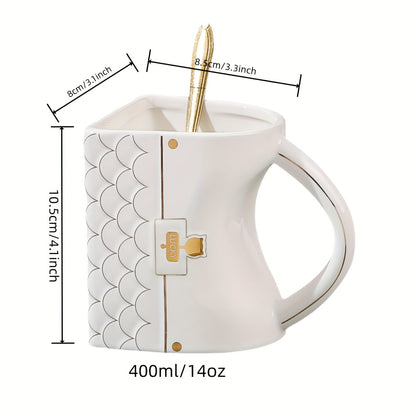 Handbag-shaped ceramic mug with spoon for coffee or tea, perfect for home or office use, with European luxury design.