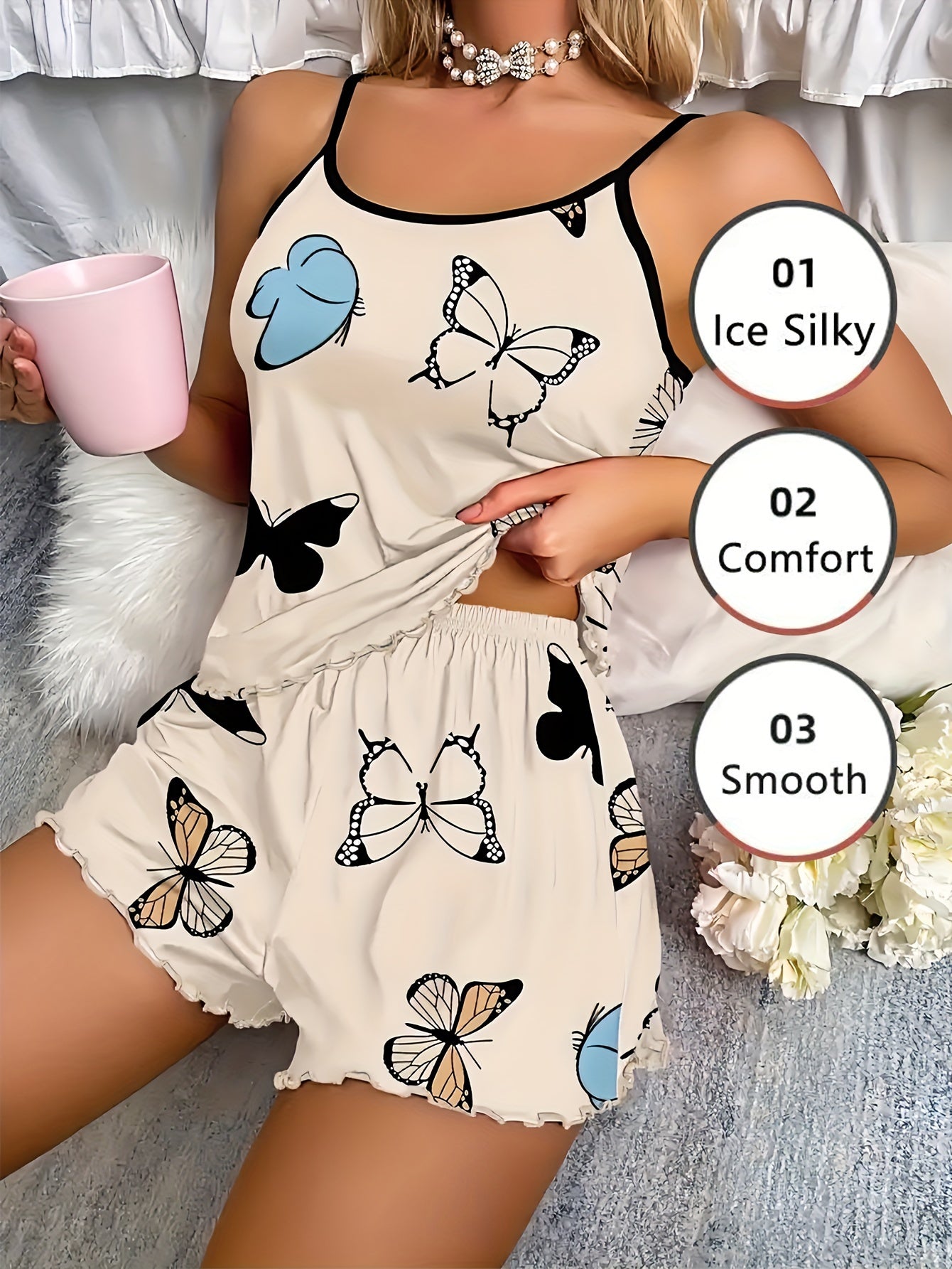 Polyester pajama set for women: Sleeveless cami with butterfly print and elastic shorts with lettuce trim, perfect for summer sleepwear