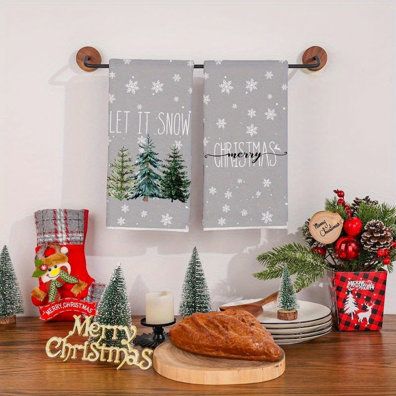 Set of two kitchen towels measuring 45.72*66.04 cm, featuring Merry Christmas and Let It Snow designs. Perfect for adding a festive touch to your home decor during the winter season. Ideal for drying dishes and adding a touch of holiday spirit to your