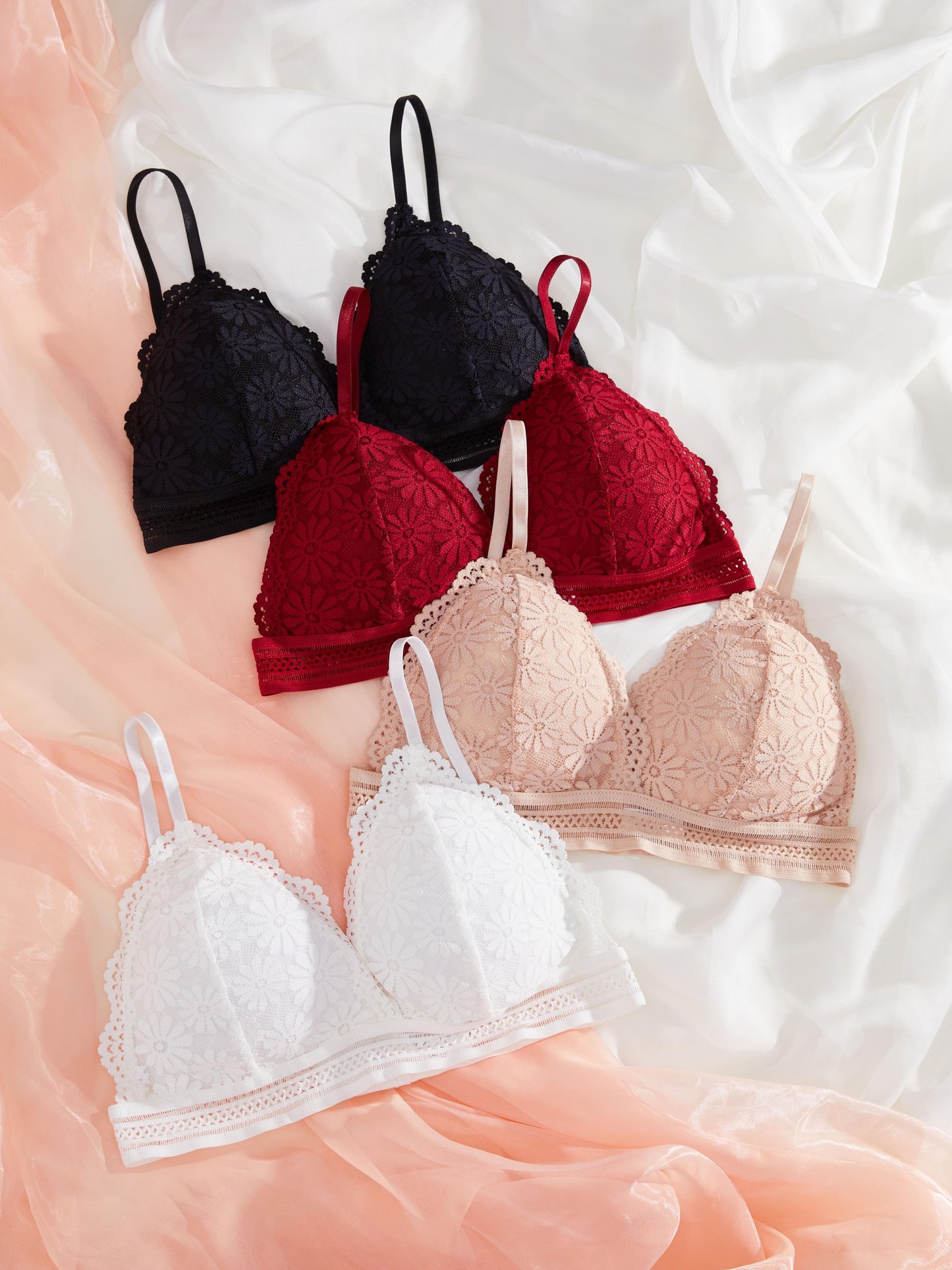 4 wireless bras with contrast lace, scalloped trim, and comfortable design for women's lingerie and underwear.