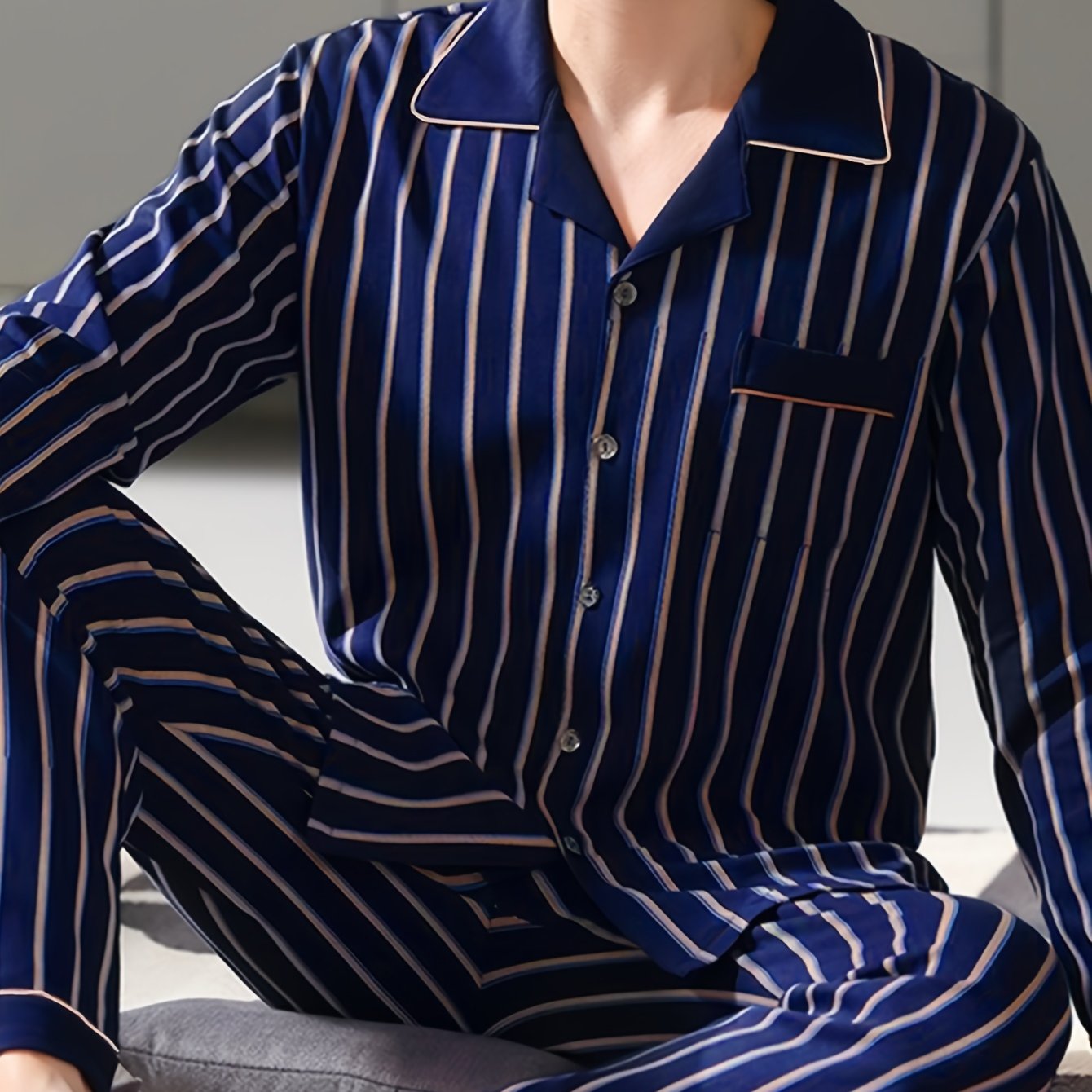 Men's long sleeve pajama set by QIANNIANMA, striped, made of polyester and elastane blend, machine washable, with pockets. Suitable for spring/autumn sleepwear and home wear. Features brand