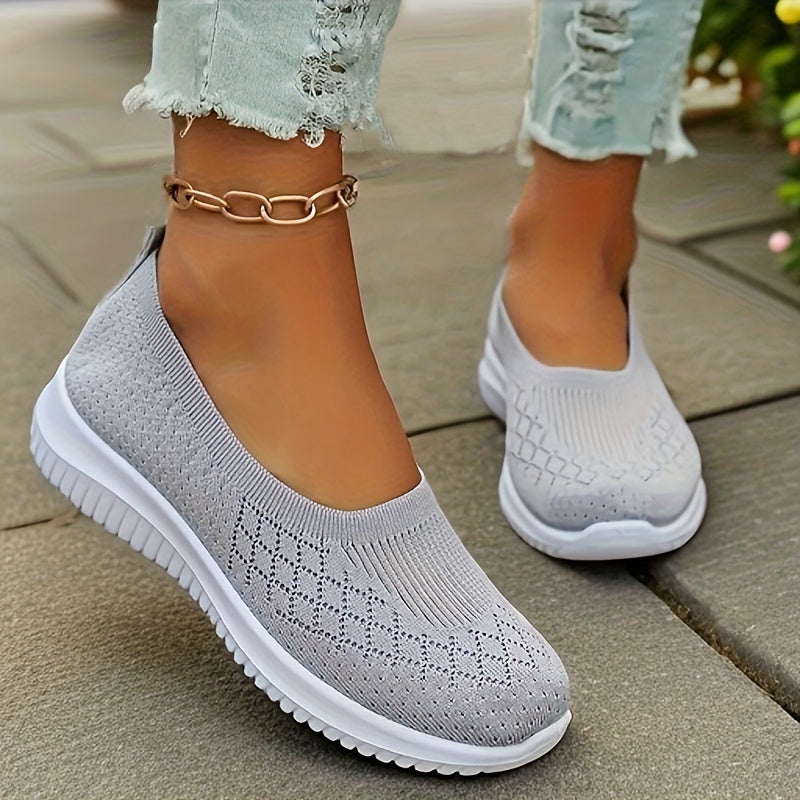 Women's lightweight, breathable slip-on sneakers with PVC sole, EVA insole, and round toe mesh for all seasons.