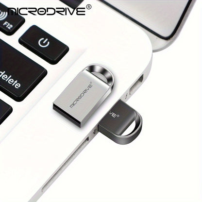 Microdrive mini USB flash drive with key ring, available in various sizes from 4GB to 128GB. Creative gift idea with MINI M1 buttons.