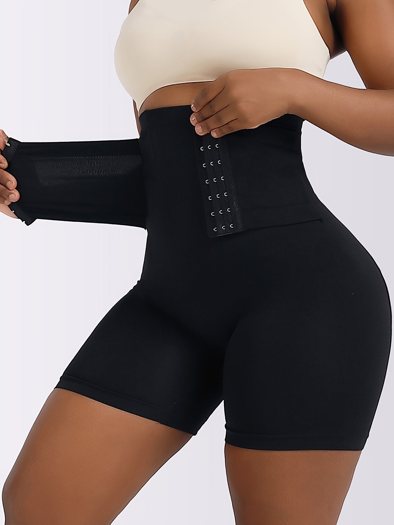 Women's high waist tummy control pants with adjustable front buckle and butt lifting feature for a slimmer waist and overall shaping.