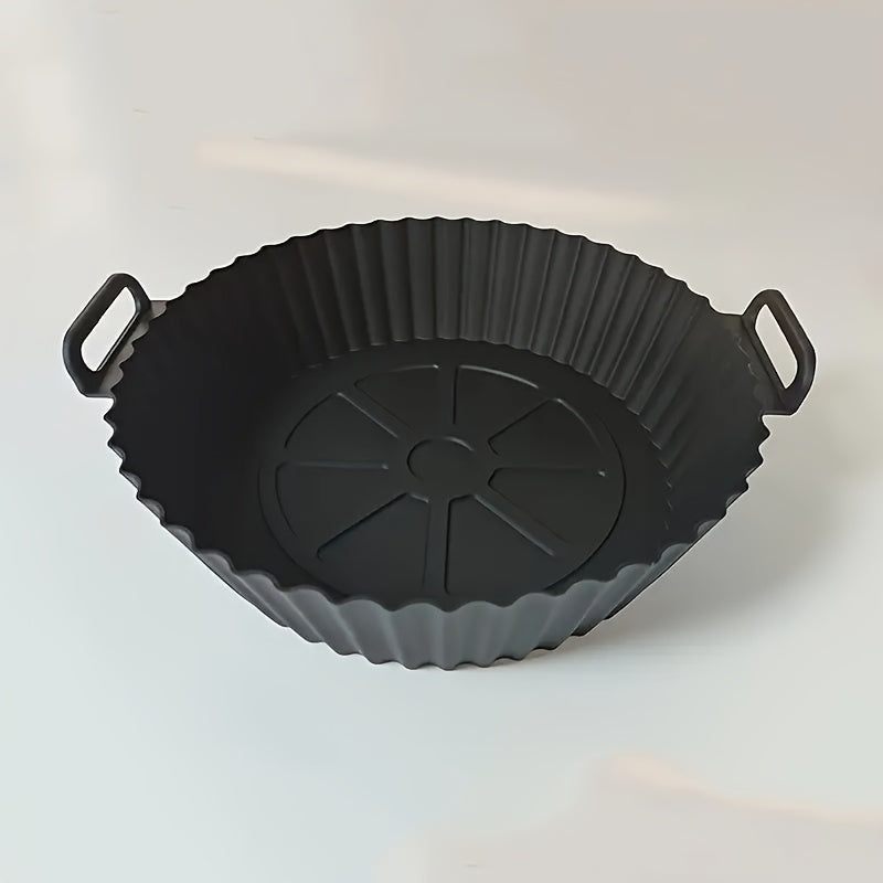 Reusable, non-stick silicone air fryer basket liner designed for 3QT-5QT air fryers. Heat resistant up to 240°C, perfect for baking and cooking. Available in blue and black, ideal for holiday parties and everyday kitchen use. Portable and folding with a