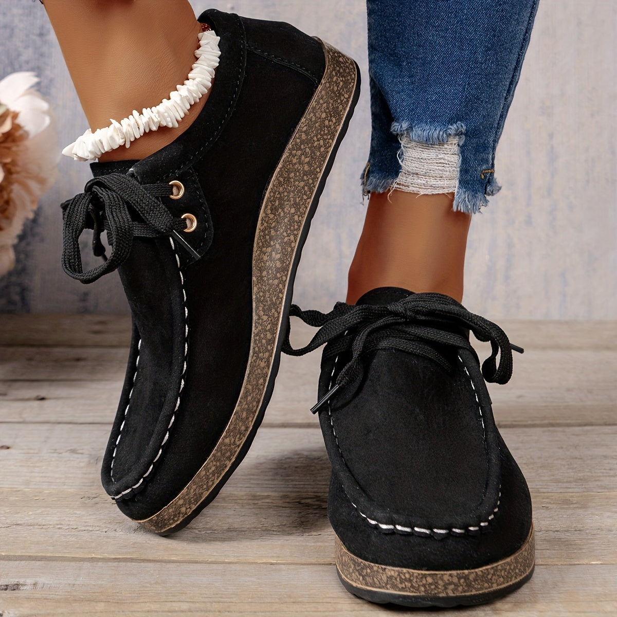 Women's casual sneakers with lace-up design and soft platform sole, a versatile low-top style available in plus size.