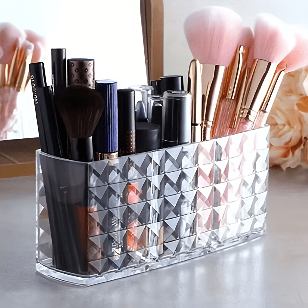 3-compartment clear makeup organizer made of polished acrylic; lightweight and hypoallergenic; perfect for storing brushes, eyebrow pencils, and lipsticks. No installation required.