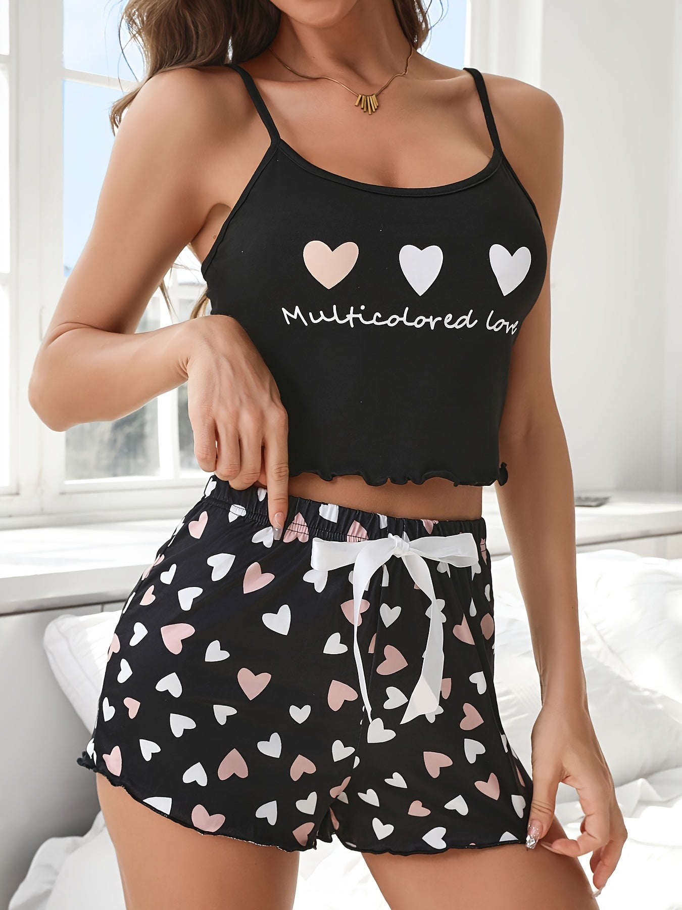 Valentine's Day pajama set featuring heart and letter print, cami top and shorts with bow detail, for women's sleepwear and loungewear.