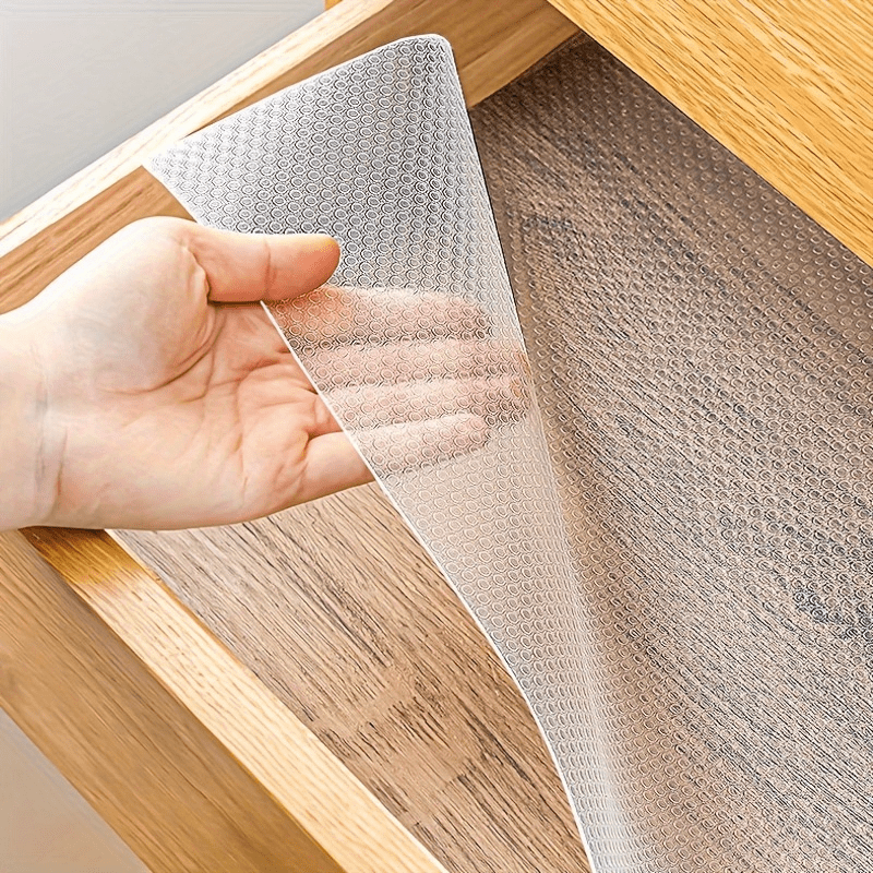 Kitchen Cabinet Liner: One-roll of multi-purpose paper liner for shelves, drawers, and cabinets. Moisture-proof, waterproof, dust-proof, and non-slip. Ideal for lining fridge shelves and kitchen cabinets.