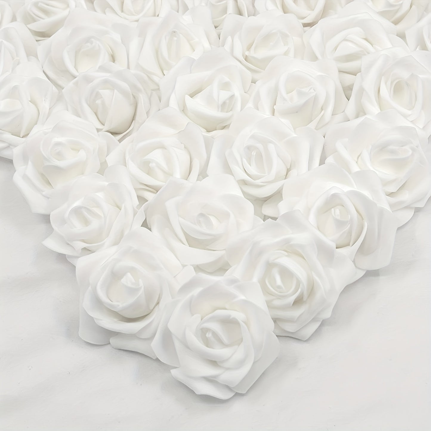 50pcs of 7.5cm Artificial Foam Rose Flower Heads in Ivory White for Wedding Party Home DIY decorations.