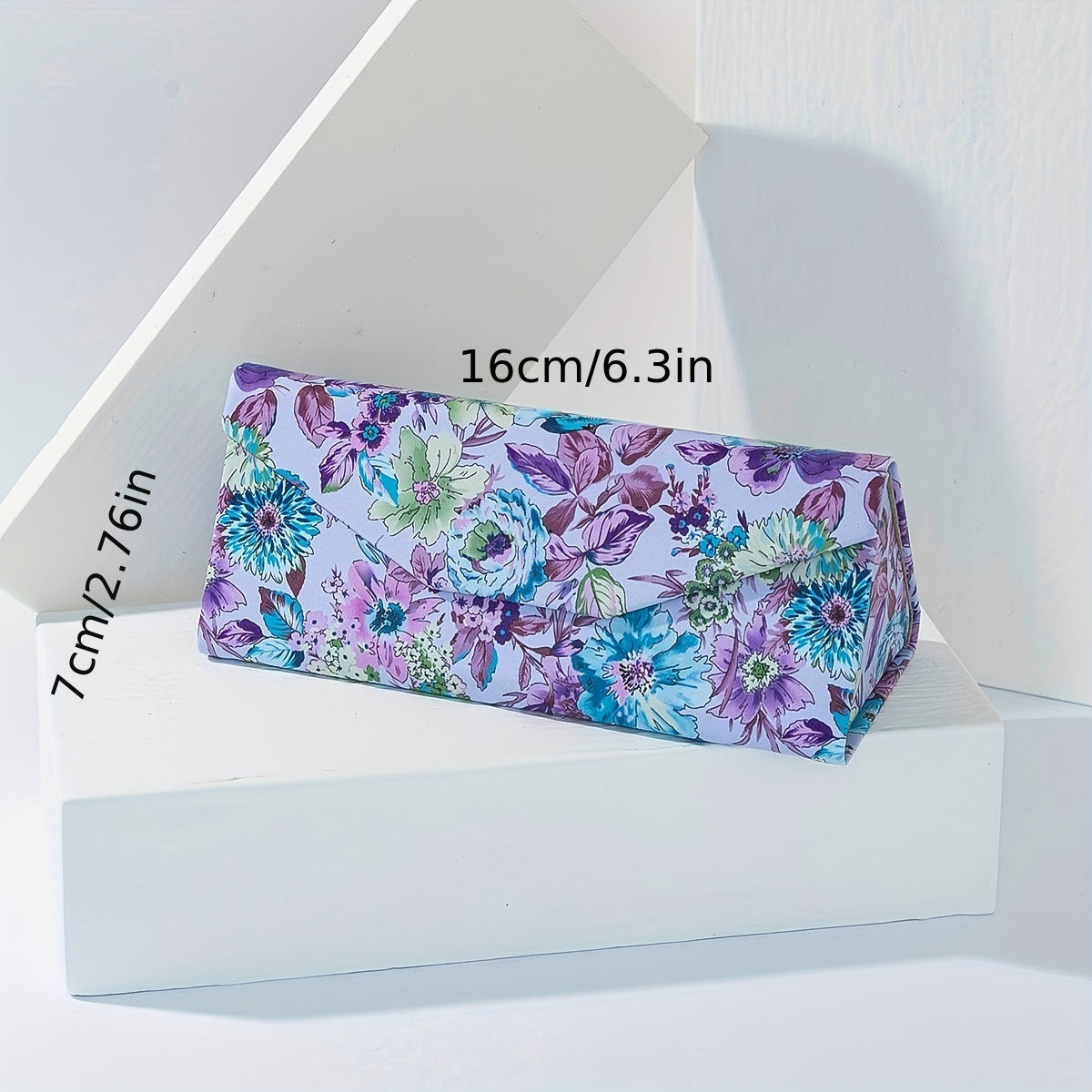 Set of 2 Eyeglass Cases: Floral design with 1 foldable case and 1 metal hard case for glasses storage.