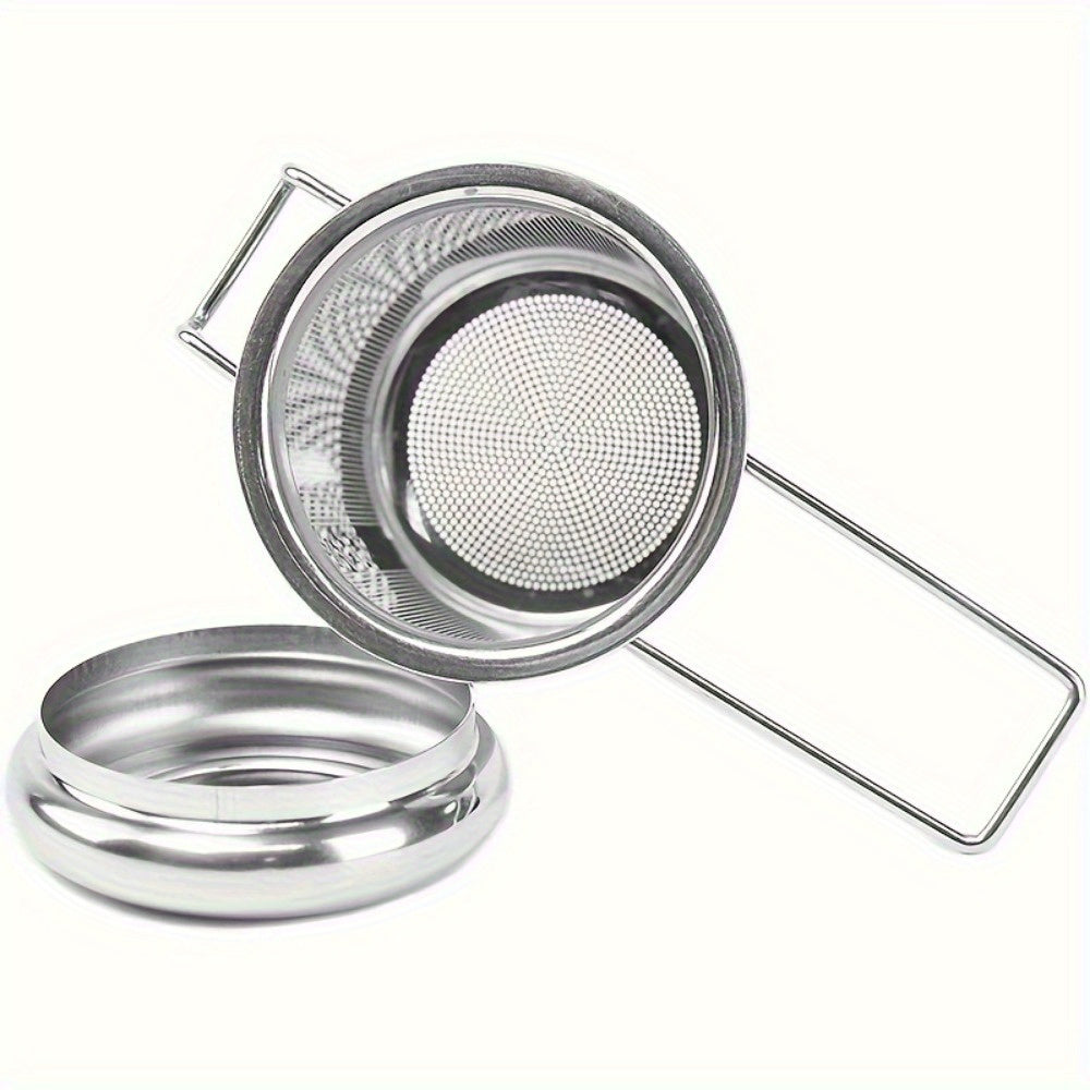 Tea infuser made of durable stainless steel for loose leaf tea, with lid and handle for convenient use at home, office, restaurant, or hotel. Features micropore metal strainer basket.