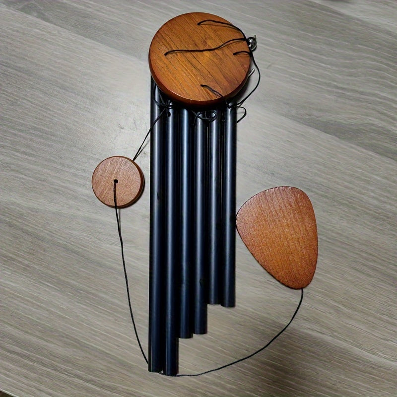 Elegant black solid wood wind chimes with aluminum tubes - perfect gift for home and garden.