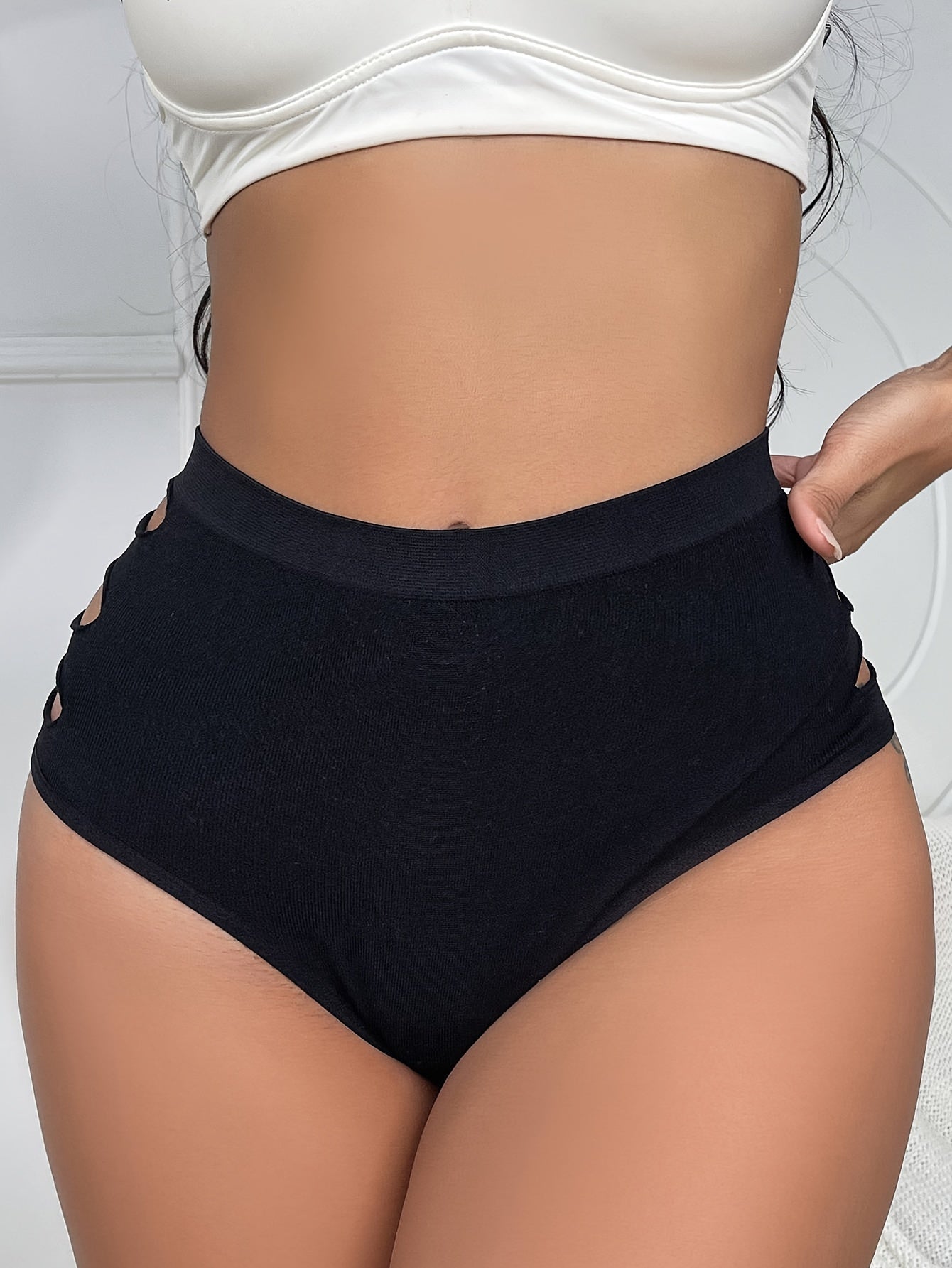 Breathable high-waist briefs with cut out design, comfortable and stretchy for women's lingerie.