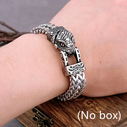 The Stainless Steel Viking Snake Head Bracelet for Men is built to last, with a fade-resistant, intricate design that exudes a punk rock style. A perfect gift for the fashion-forward man in your life, this dominant piece of jewelry will never lose its