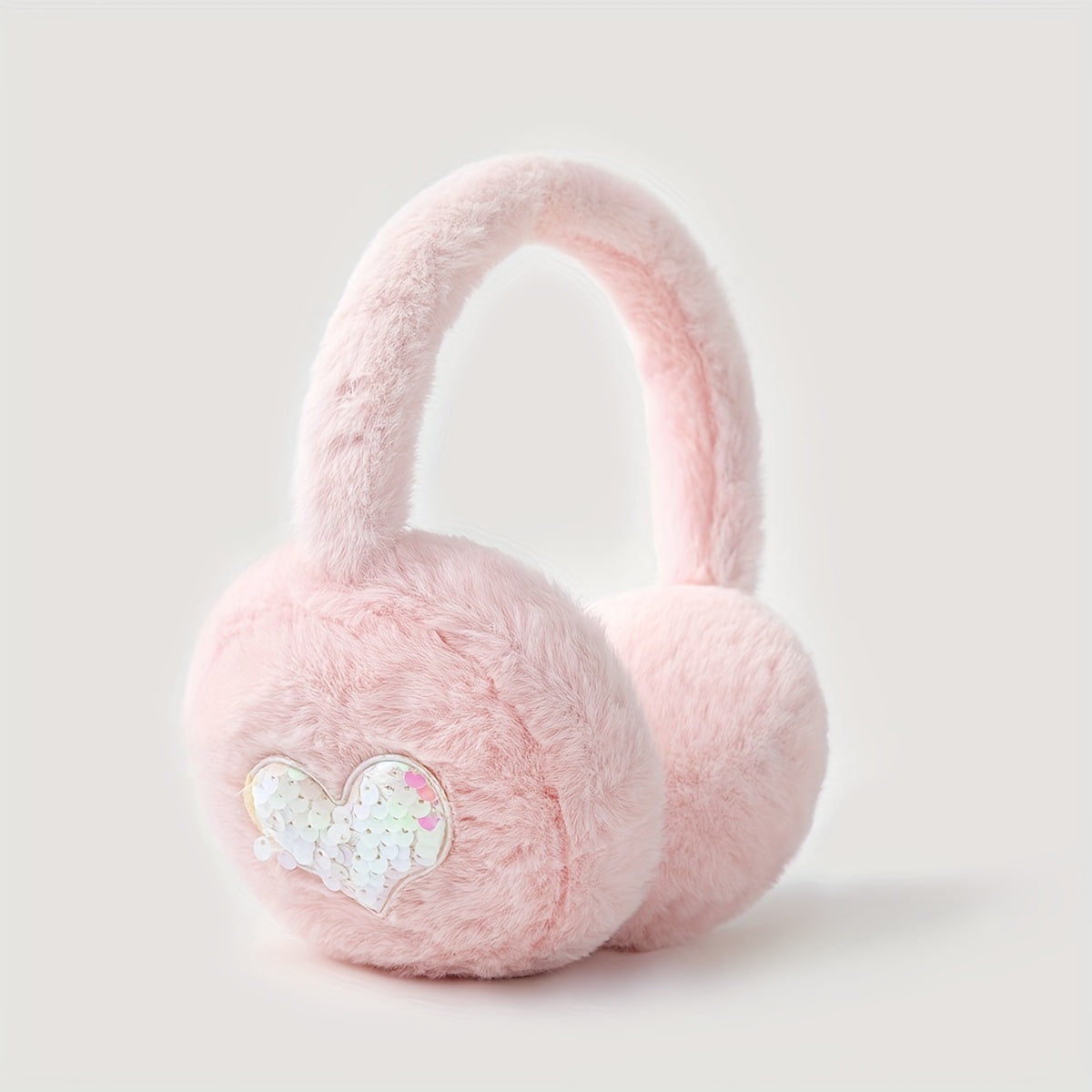 Keep cozy and stylish with these adorable Pink Heart Plush Earmuffs - perfect for daily use during the cold winter months. Made with thick materials, they provide excellent warmth and protection for your ears during outdoor activities.