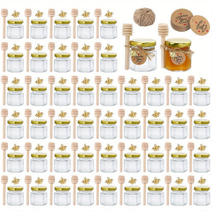 Small hexagonal glass honey jars come in 1.5 oz sizes in sets of 20, 30, 50, or 60. Each jar includes a spoon, bee symbol, and thank you card. They have golden lids and are ideal for baby gifts, weddings, and parties.