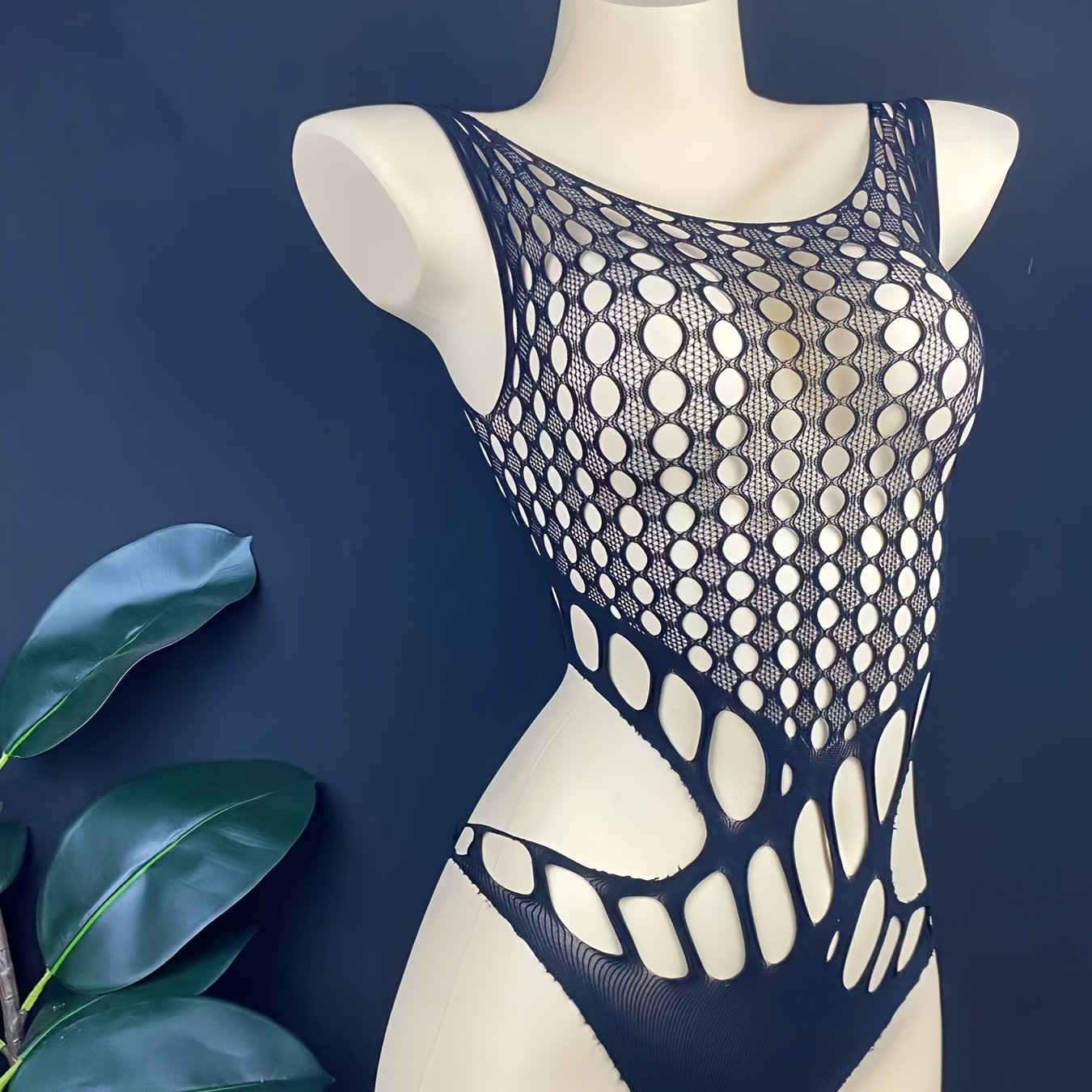 Nylon bodysuit with hook knit cutout design and tight fit for adult women's sexy streetwear.