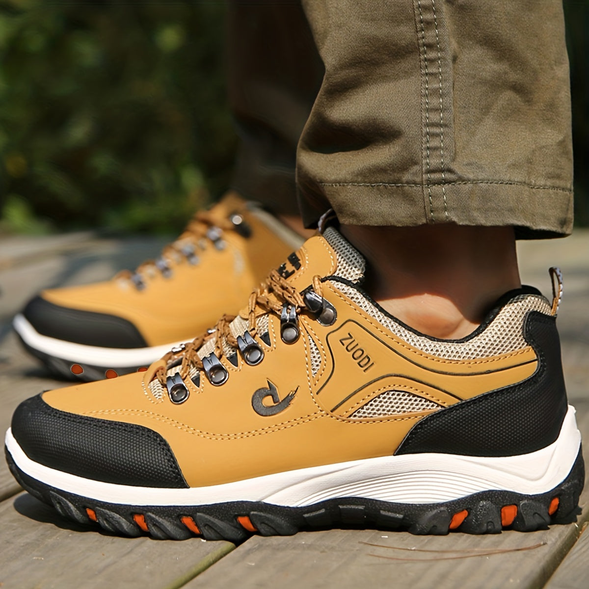 Durable lace-up sneakers for men with breathability, ideal for hiking.