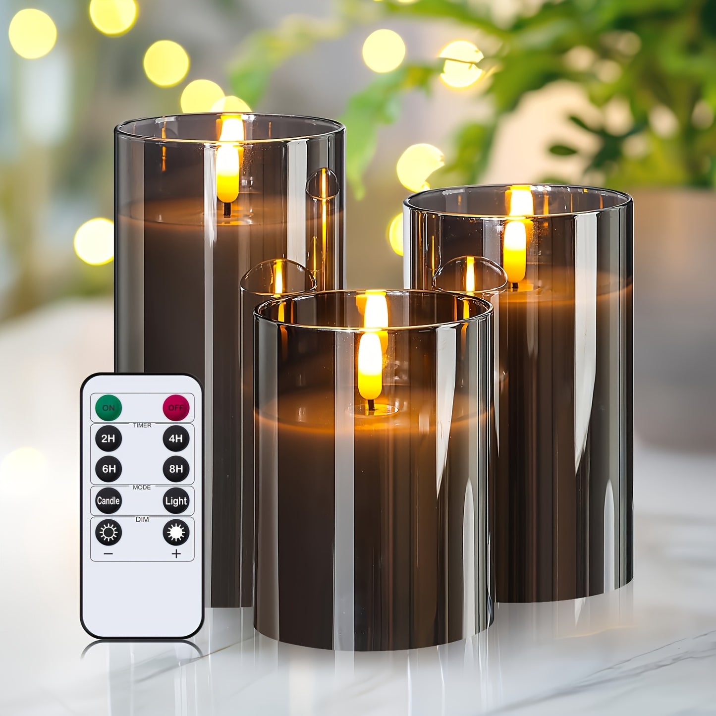 Three gray fireless LED candles with remote control and timer, battery-operated plastic column candles with realistic flashing effect, powered by non-rechargeable AA batteries, suitable for