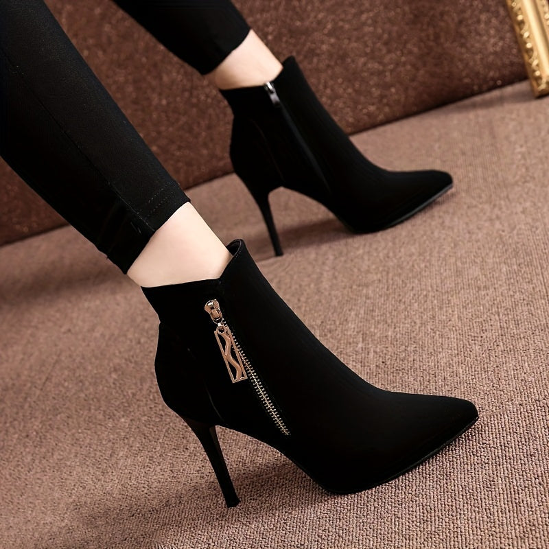 Stylish black high-heel ankle boots with pointed toe and stiletto heel, featuring a flannel upper and side zipper closure. Perfect for parties, weddings, and everyday wear in the fall