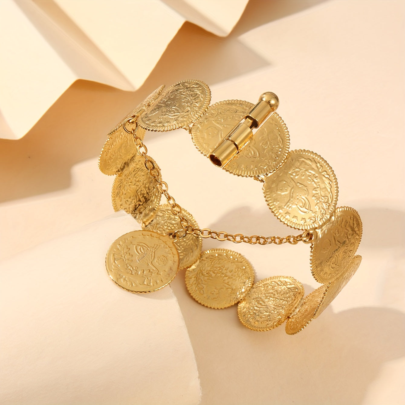 22K gold plated bangle bracelet with coin detail, inspired by vintage style. Made of copper alloy, suitable for both everyday and party wear.