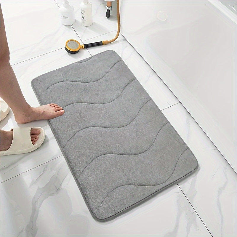 Soft and comfortable bath mat with high absorbency - ideal for bathrooms, showers, and bathtubs. Rectangular in shape, waterproof, and easy to clean.