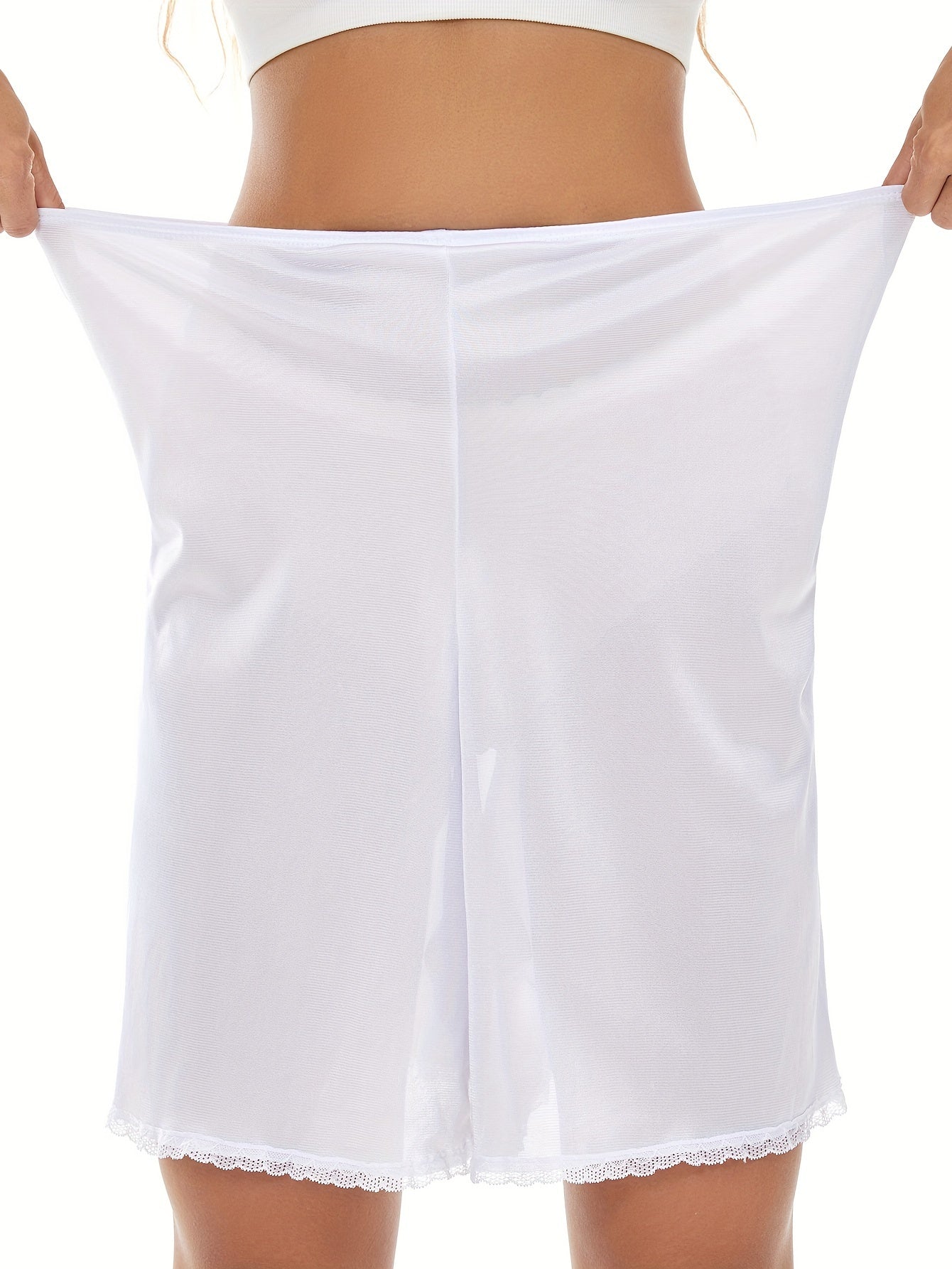 Polyester slip skirt with lace trim, light support shapewear.