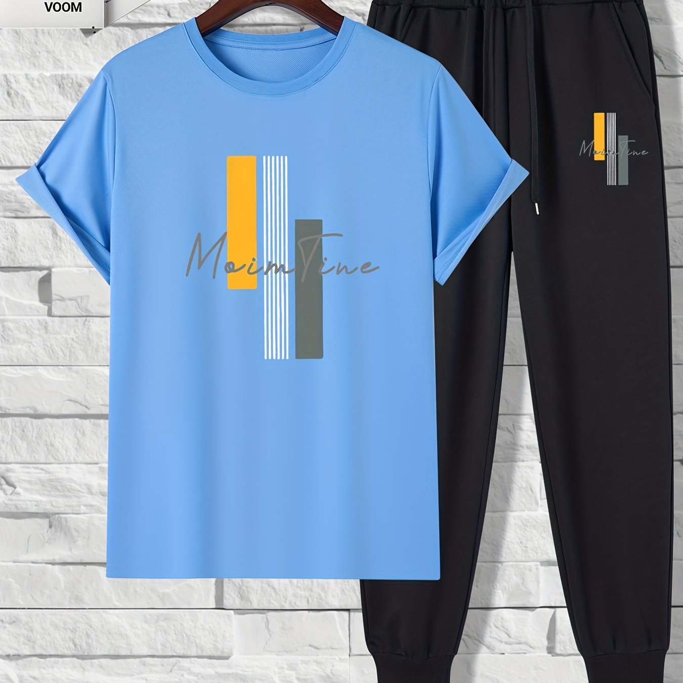 Men's 2-piece outfit with color block print, includes short sleeve t-shirt and drawstring trousers.